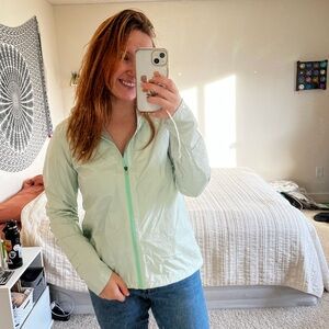 teal/aqua the north face rain jacket